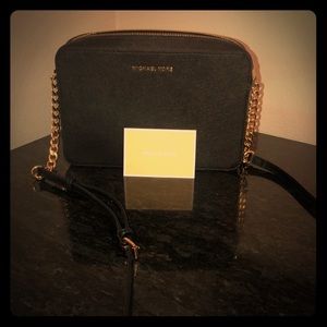 Like new Michael Kors black crossbody/gold chain